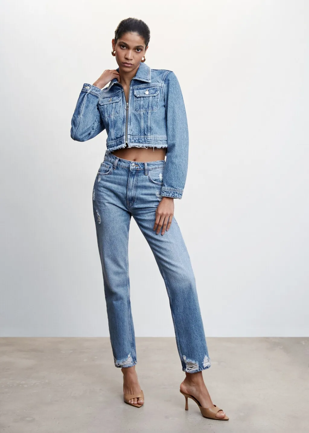 Jeans diritti vita alta strappa
